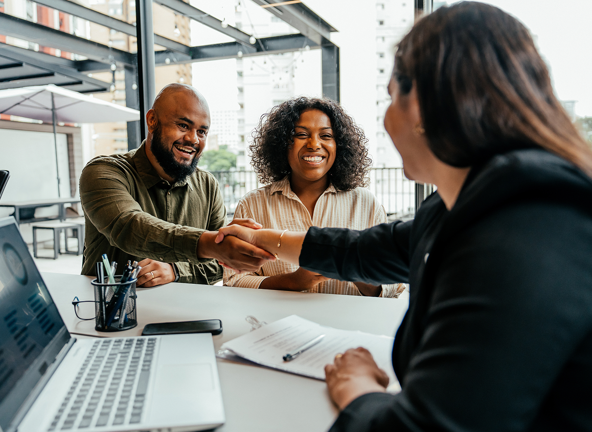 Friendly business discussion in modern setting